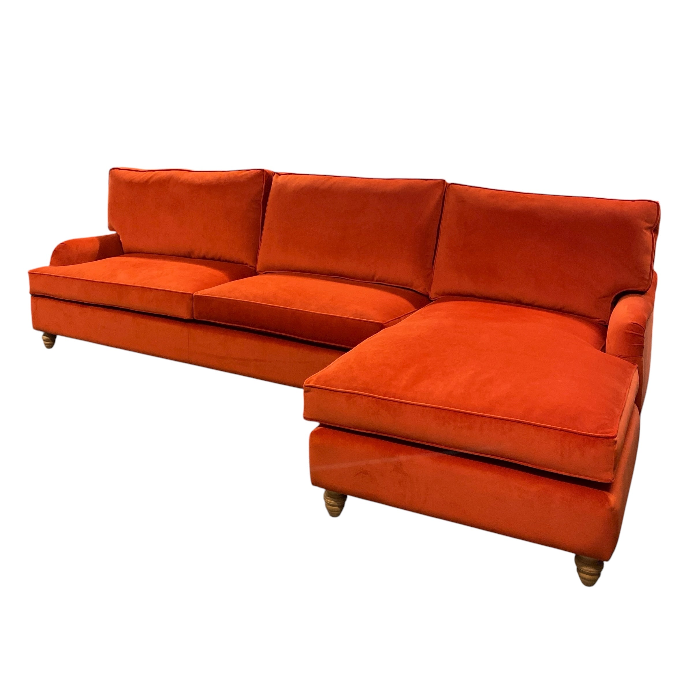 Orange sectional sofa on a white background