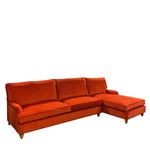 Load image into Gallery viewer, Orange sectional sofa on a white background
