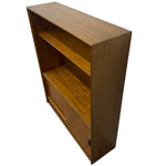Load image into Gallery viewer, side angle of a wooden bookcase
