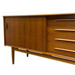 Load image into Gallery viewer, Wooden sideboard with a closed door and open drawers on a white background
