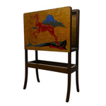 Load image into Gallery viewer, Wooden magazine rack with sabred legs and painted mural
