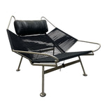 Load image into Gallery viewer, Modern lounge chair with black mesh seat and backrest on a white background
