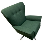 Load image into Gallery viewer, Green upholstered chair with a tufted backrest on a white background
