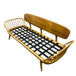 Load image into Gallery viewer, Wooden bed frame with black mattress on a white background
