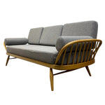 Load image into Gallery viewer, Gray sofa with wooden frame on a white background
