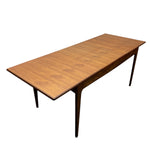 Load image into Gallery viewer, Wooden dining table with a white background
