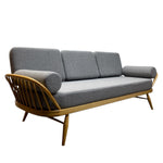 Load image into Gallery viewer, Gray sofa with wooden frame on a white background
