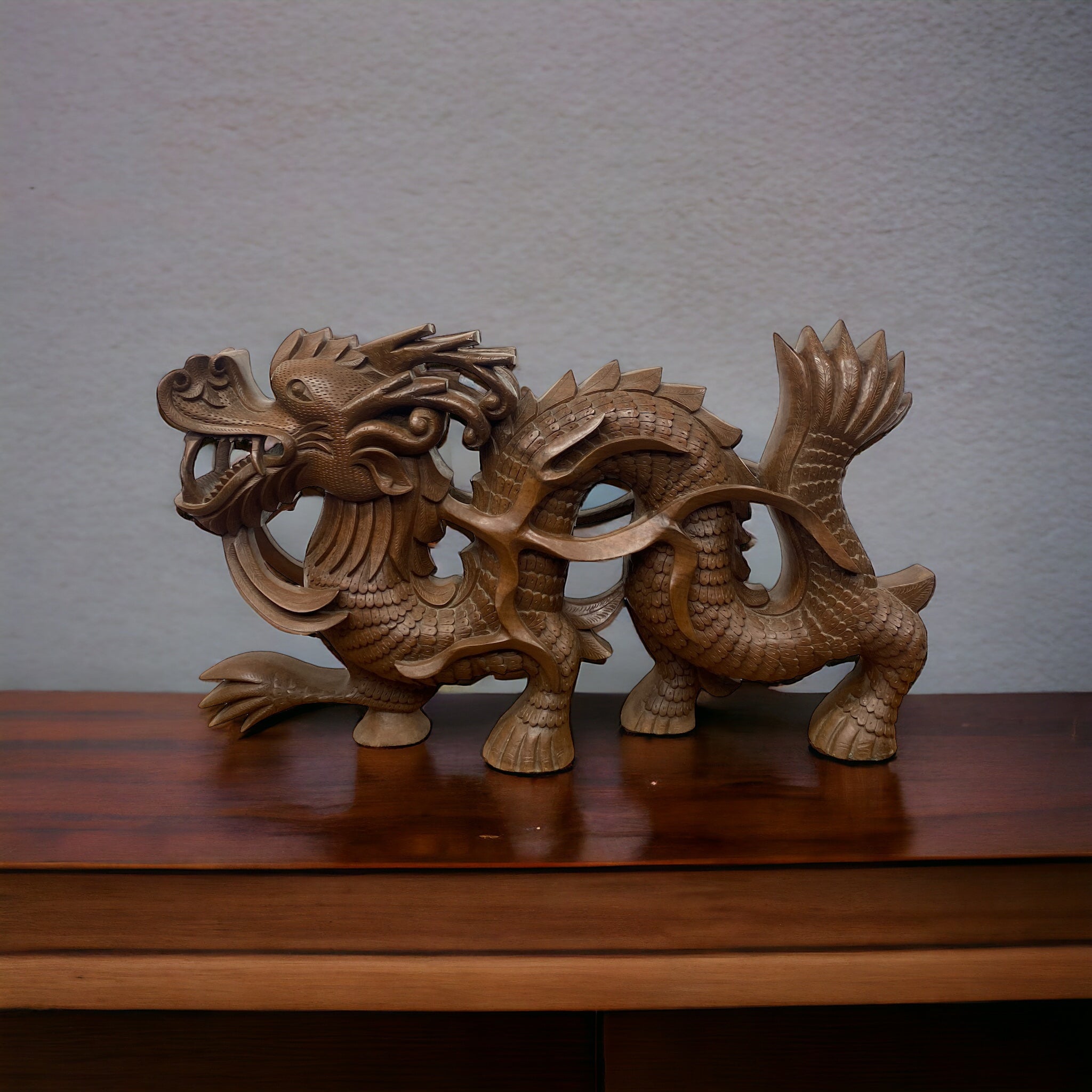 On a shelf Chinese Dragon Hand Carved Teak