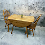 Load image into Gallery viewer, Folded Ercol Drop Leaf Dining Table Blonde
