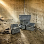Load image into Gallery viewer, stack of crates in an industrial setting
