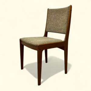 Danish Wooden chair with woven backrest on a white background
