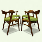 Load image into Gallery viewer, Danish Four wooden chairs with green cushions on a white background
