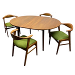 Load image into Gallery viewer, Danish Oval wooden table with four matching chairs on a white background
