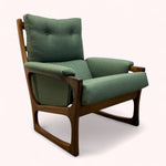 Load image into Gallery viewer, Green armchair with wooden frame on a white background
