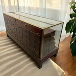 Load image into Gallery viewer, Wooden display case with glass top on a striped rug
