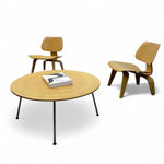 Load image into Gallery viewer, Wooden table with a book and two chairs on a white background
