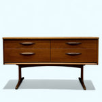 Load image into Gallery viewer, Wooden dresser with four drawers on a white background
