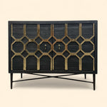 Load image into Gallery viewer, Black cabinet with geometric gold patterns on a beige background

