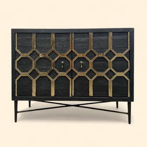 Black cabinet with geometric gold patterns on a beige background