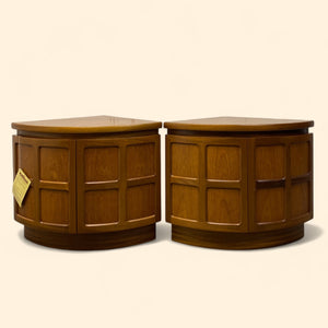 Pair of wooden side tables on a beige background