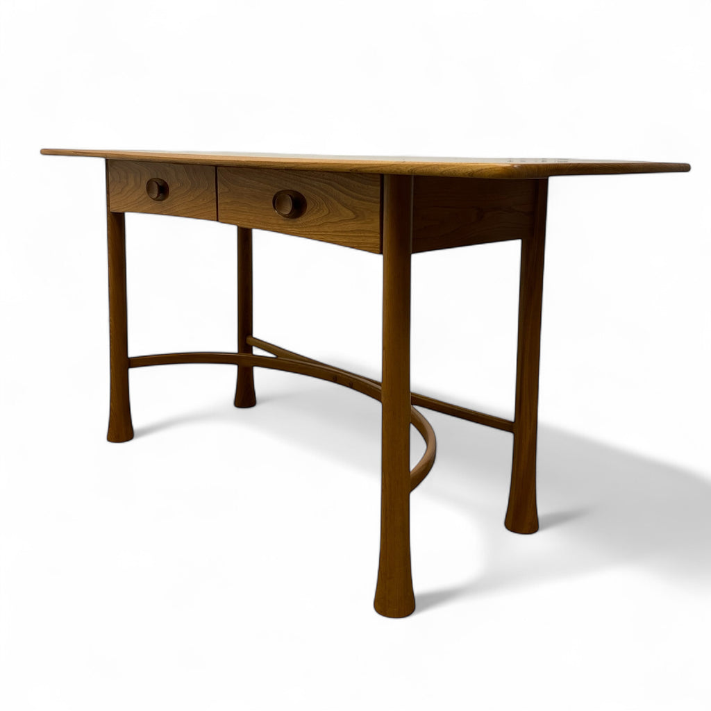 Wooden desk with two drawers on a white background