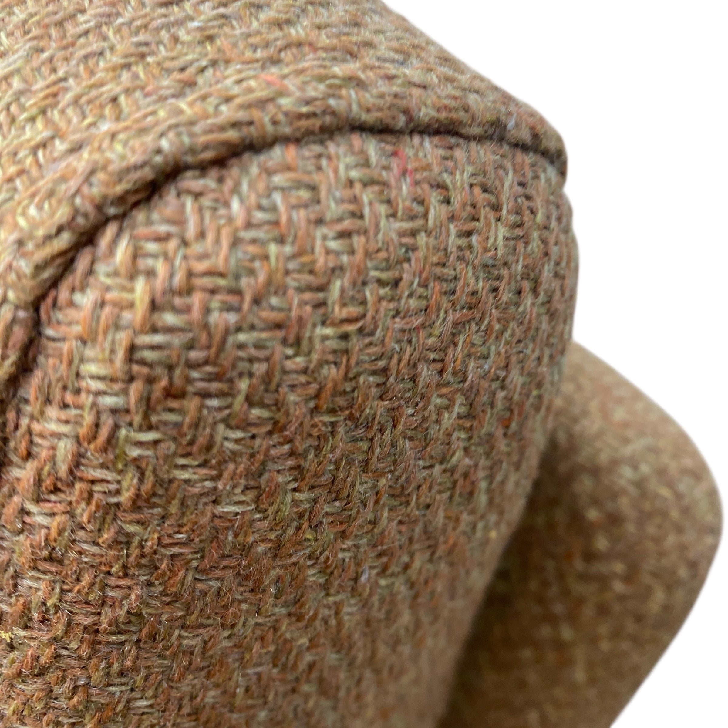 Close-up of a brown tweed cHAIR on a white background