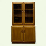 Load image into Gallery viewer, Wooden cabinet with glass doors on a white background
