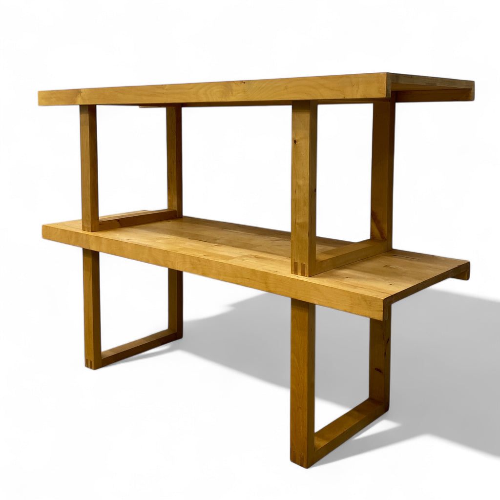 Wooden shelf with two levels on a white background