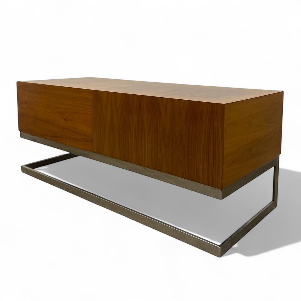 Wooden console table with a metallic base on a white background