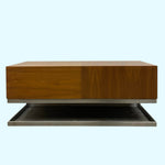 Load image into Gallery viewer, Wooden coffee table with a reflective base on a white background
