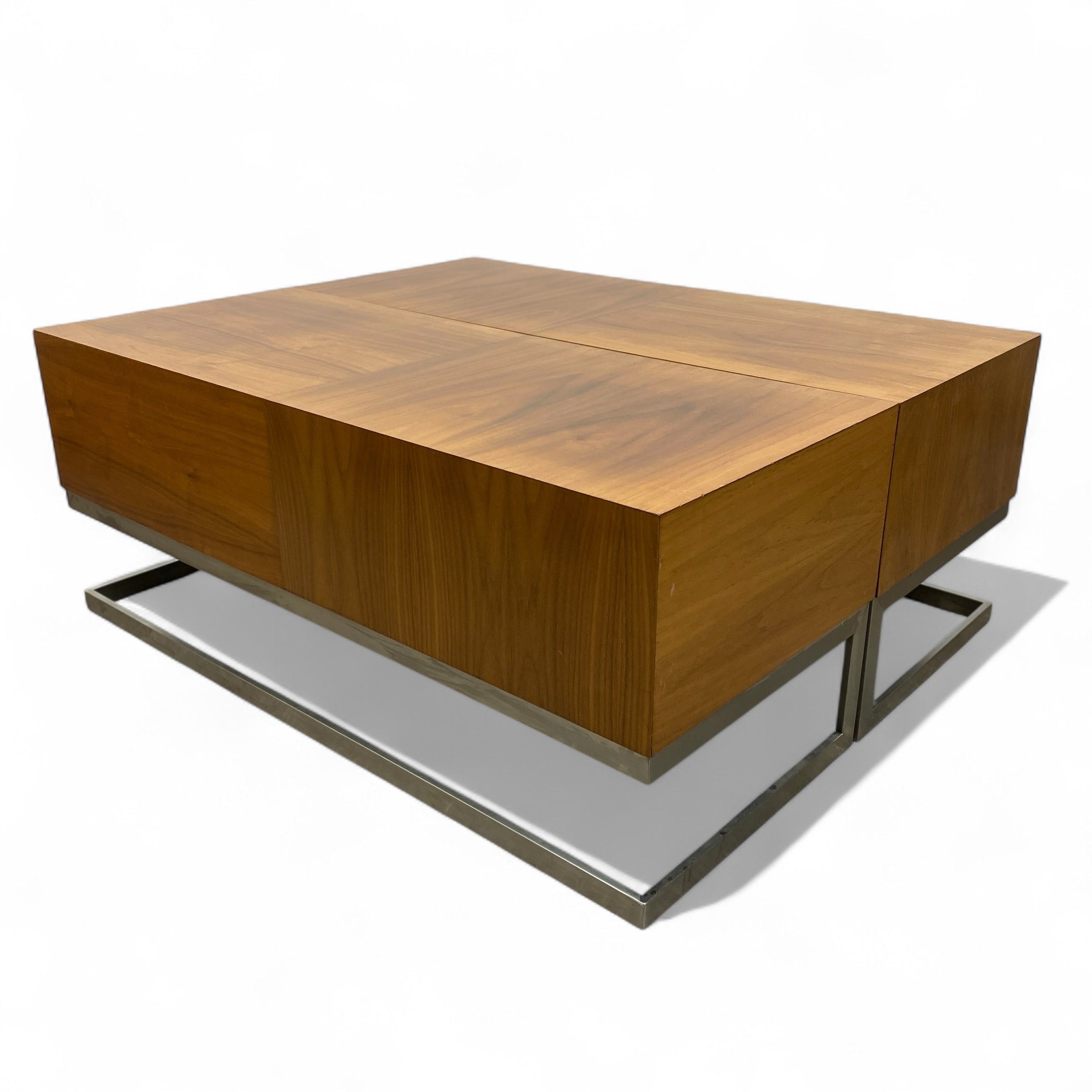 Wooden coffee table with metal base on a white background