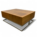 Load image into Gallery viewer, Wooden coffee table with metal base on a white background
