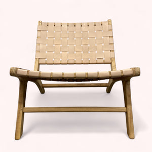 Woven chair with wooden frame on a white background
