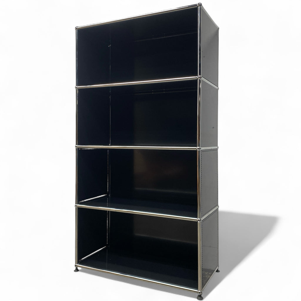 Black metal bookshelf with THREE shelves on a white background