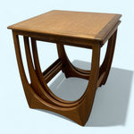 Load image into Gallery viewer, Wooden side table with a unique design on a light blue background
