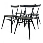 Load image into Gallery viewer, Set of black chairs on a white background
