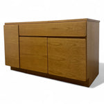 Load image into Gallery viewer, Wooden sideboard with three doors on a white background
