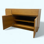 Load image into Gallery viewer, Wooden cabinet with open door on a white background
