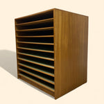 Load image into Gallery viewer, Wooden plan chest with multiple shelves on a beige background
