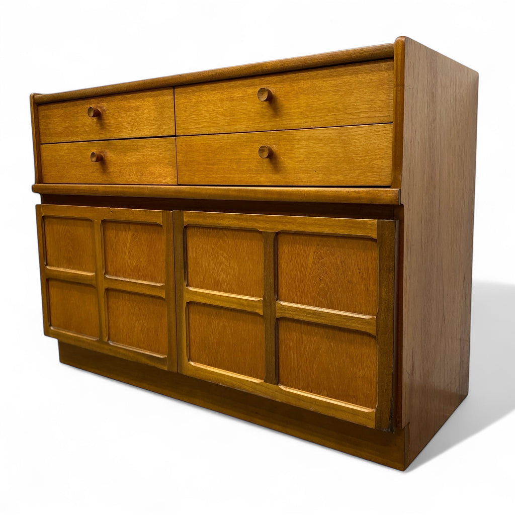 Wooden dresser with multiple drawers on a white background