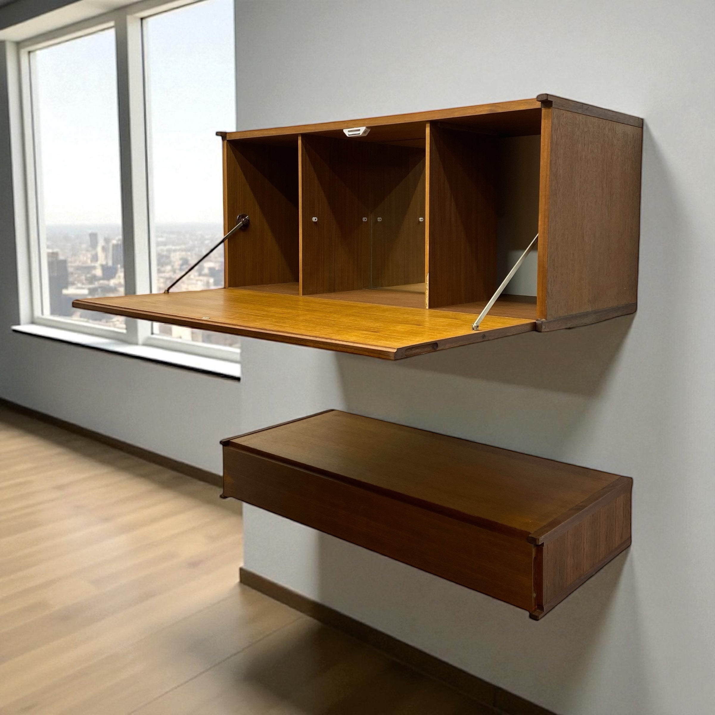 Wooden wall-mounted cocktail cabinet in a room with large windows