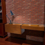 Load image into Gallery viewer, desk and drawers against a red brick wall
