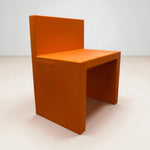 Load image into Gallery viewer, Orange chair with &#39;Sleek&#39; branding on a light background

