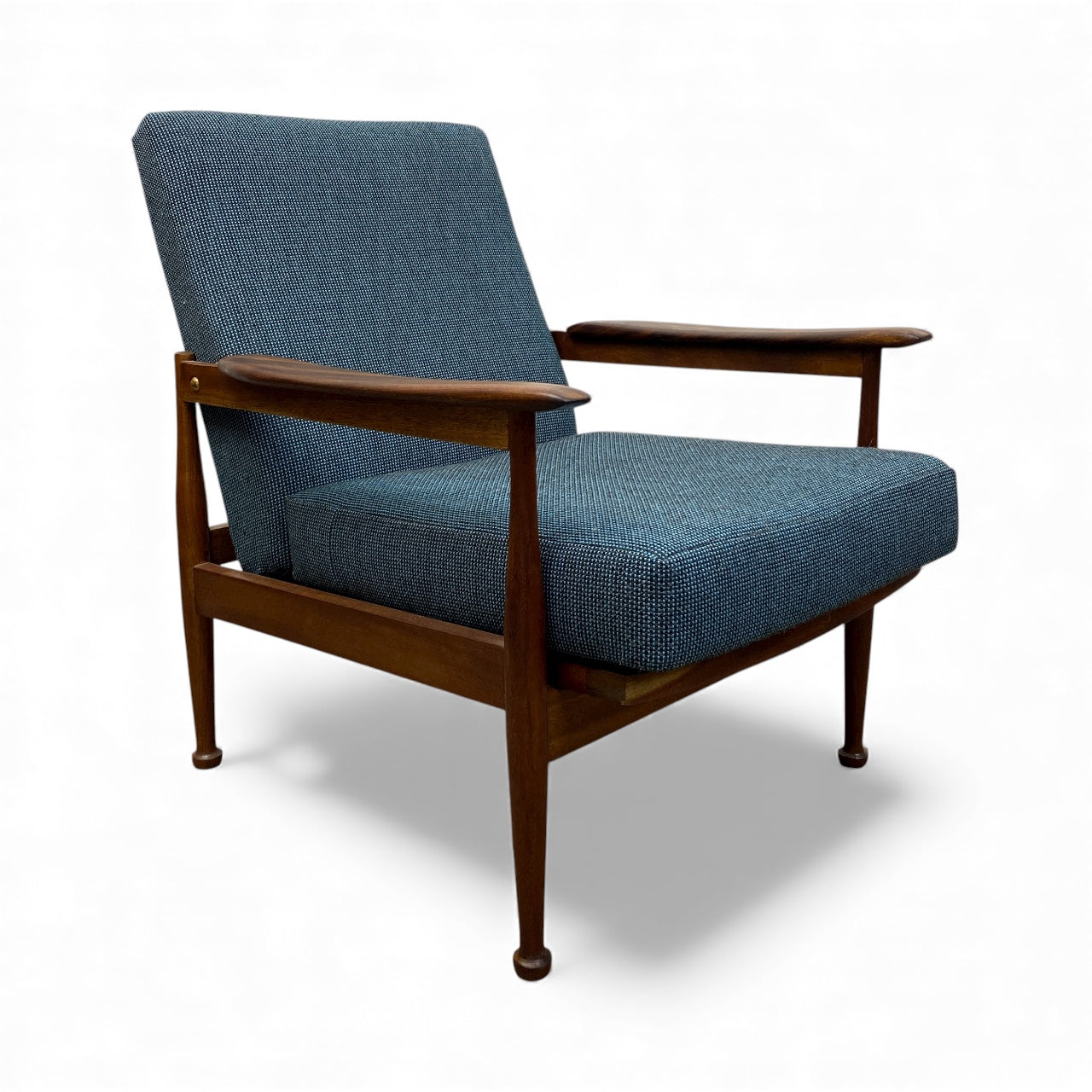 Blue upholstered armchair with wooden frame on a white background