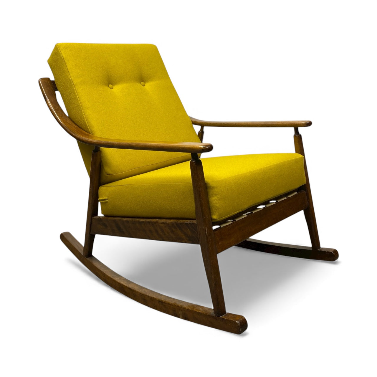 Wooden rocking chair with yellow cushions on a white background