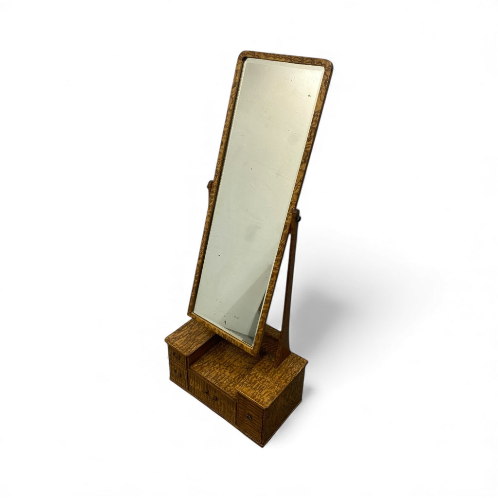 Wooden standing mirror with wavy wood grain design on a white background