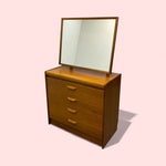 Load image into Gallery viewer, Wooden dresser with mirror on a pink background
