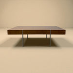 Load image into Gallery viewer, Wooden table with metal legs on a beige background
