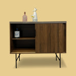 Load image into Gallery viewer, Wooden cabinet with decorative items on a beige background
