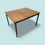 Load image into Gallery viewer, Wooden table on a light blue background
